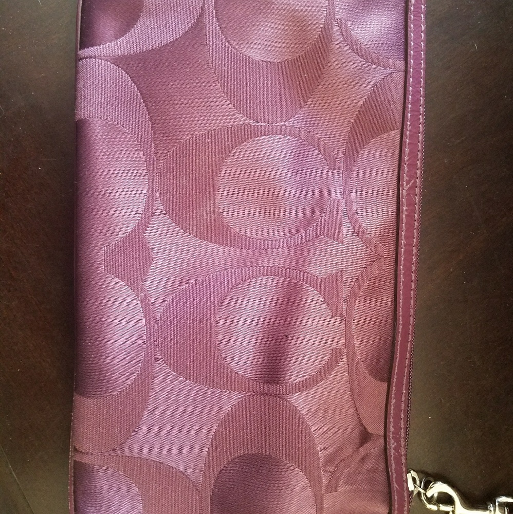 Coach small purple wristlet
